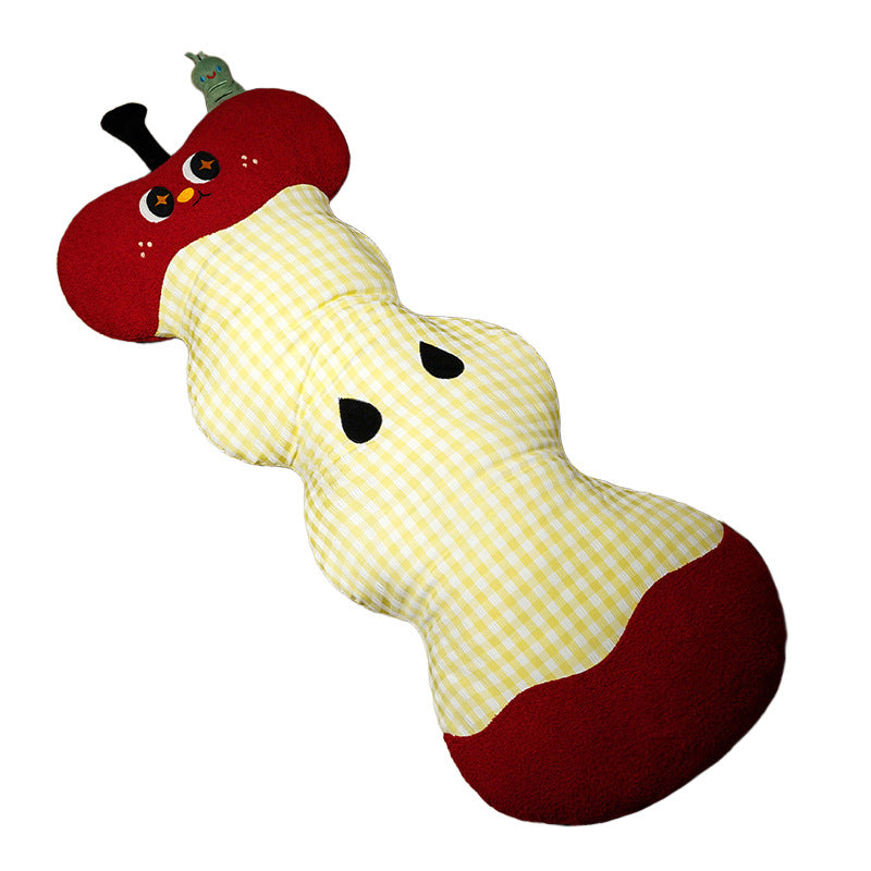 Extra-long ergonomic cuddle body pillow in apple core design with gingham cover and soft plush ends