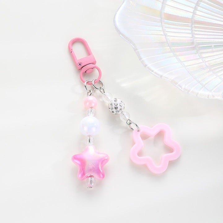Playful keychain with floral and star motif Kalsten