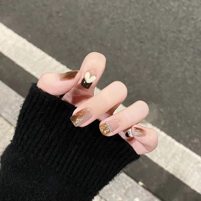 Artistic Nail Extensions with Heart and Glitter Accents Kalsten