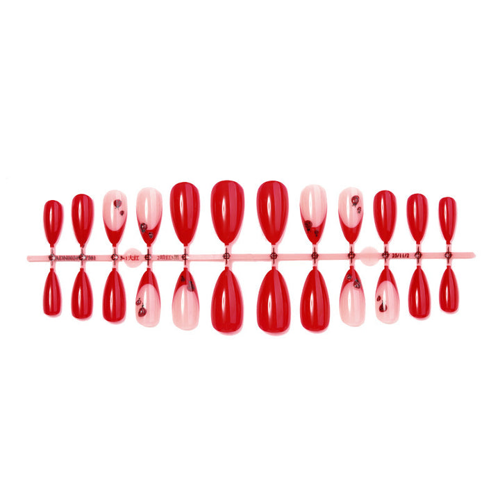 Glamorous artificial nails with jewel details Kalsten