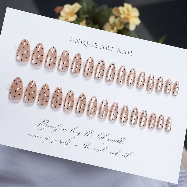 Artistic Press-On Nails with Polka Dot Design