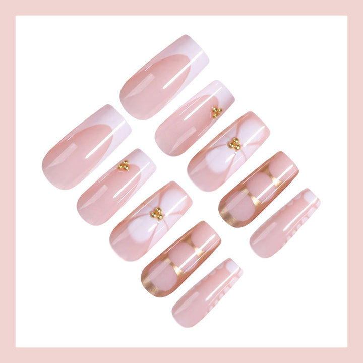 Artificial nail set with elegant gold embellishments and romantic accents Kalsten