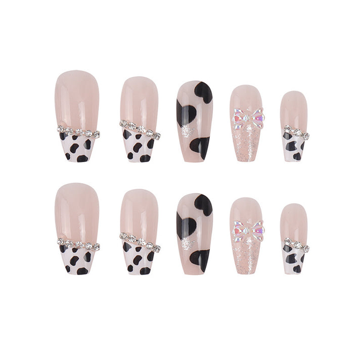Cow Print Press-On Nails with Bow and Glitter Accent Kalsten