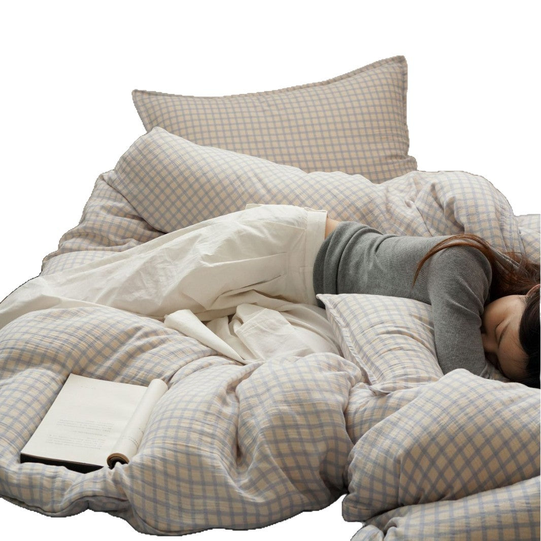 Checked cotton bedding set with soft percale texture and reversible pillowcases