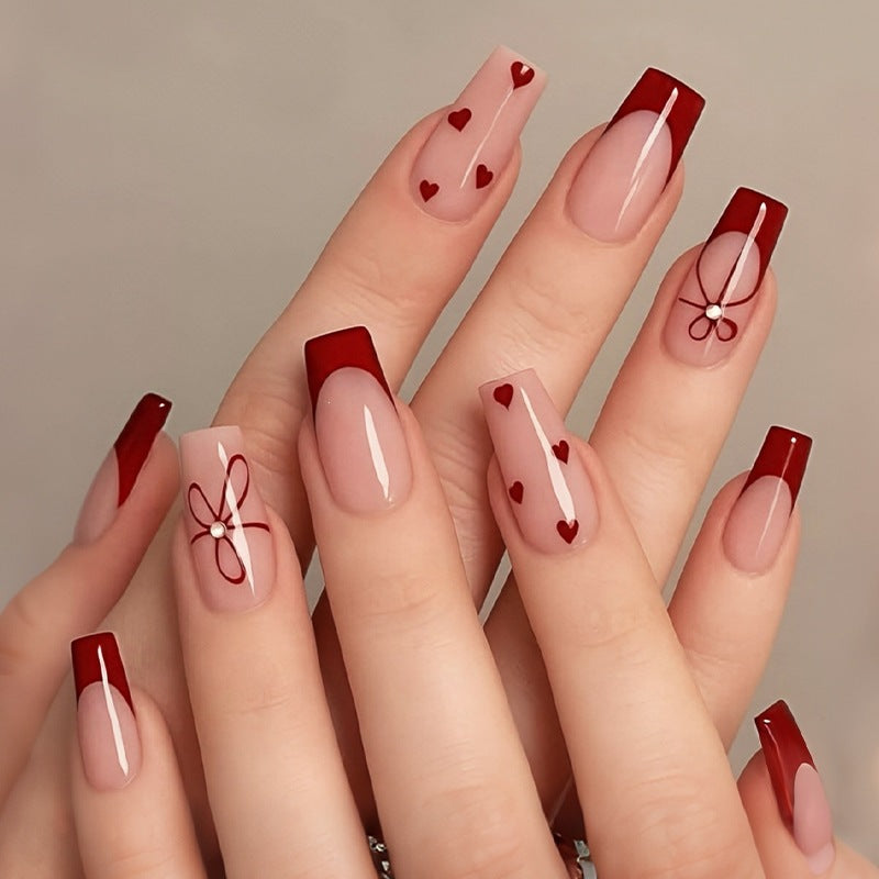 Artificial nail set with stylish hearts and elegant accents Kalsten
