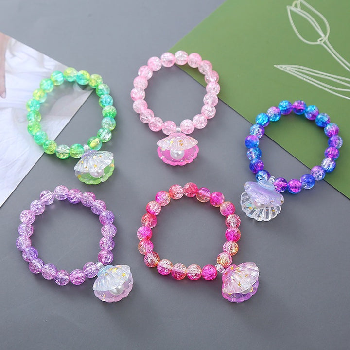 Playful bracelet with shell pendant Kalsten