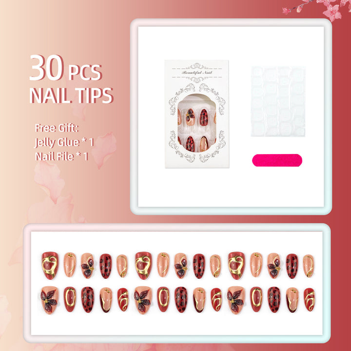 Artistic Press-On Nail Set with Floral and Metallic Accents