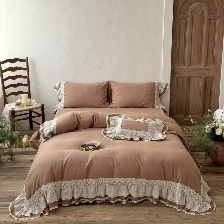 Romantic bedding set in country house style with ruffles and lace trim