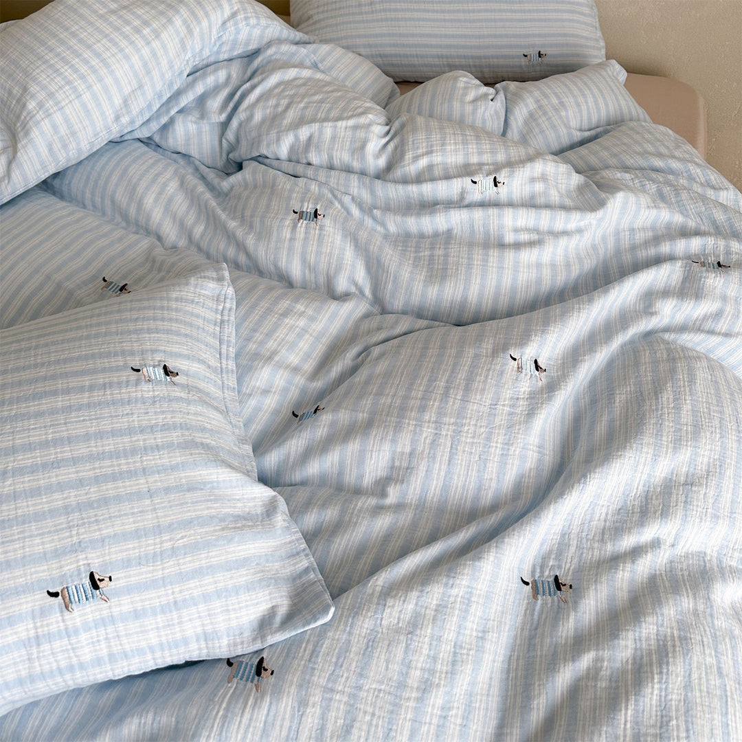 Cotton duvet cover set with fine pinstripes and subtle embroidery applications