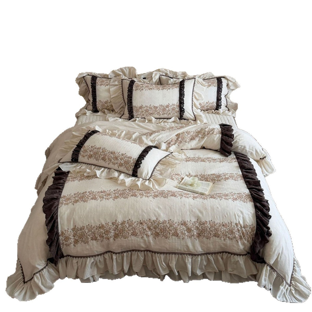 Vintage-inspired country house bedding set with ruffles and floral ribbon embroidery