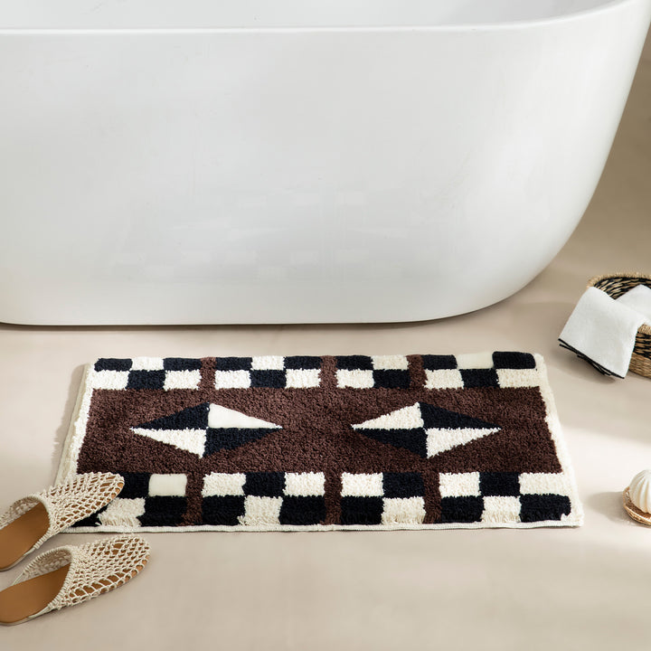 Tufted, soft bath mat with geometric ethnic pattern and non-slip underside Kalsten