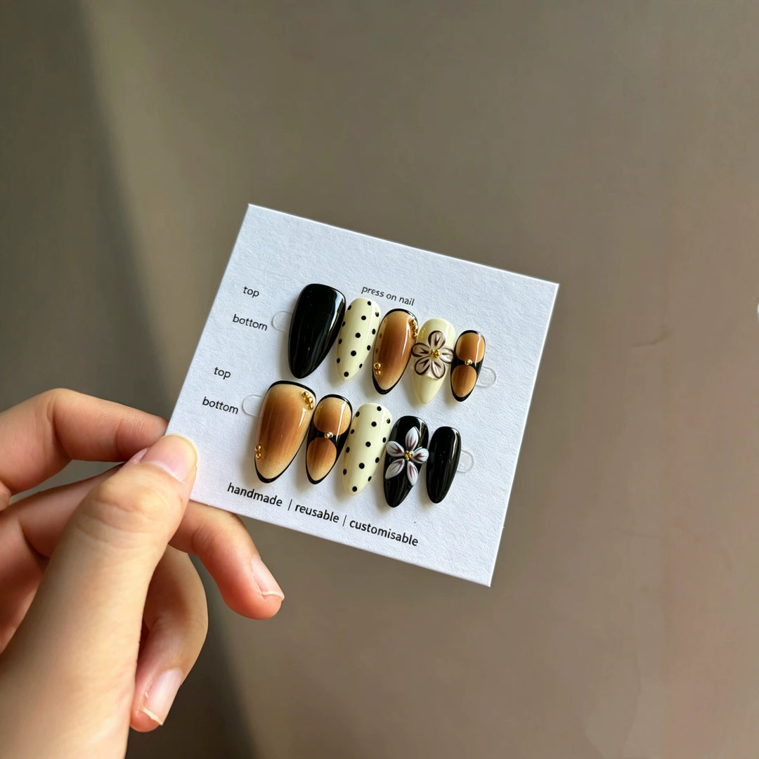 Artistic Press-On Nail Set with Reusable Floral and Polka Dot Designs