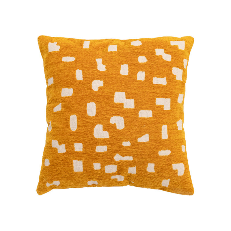 Decorative cushion with abstract pixel pattern and soft bouclé cover