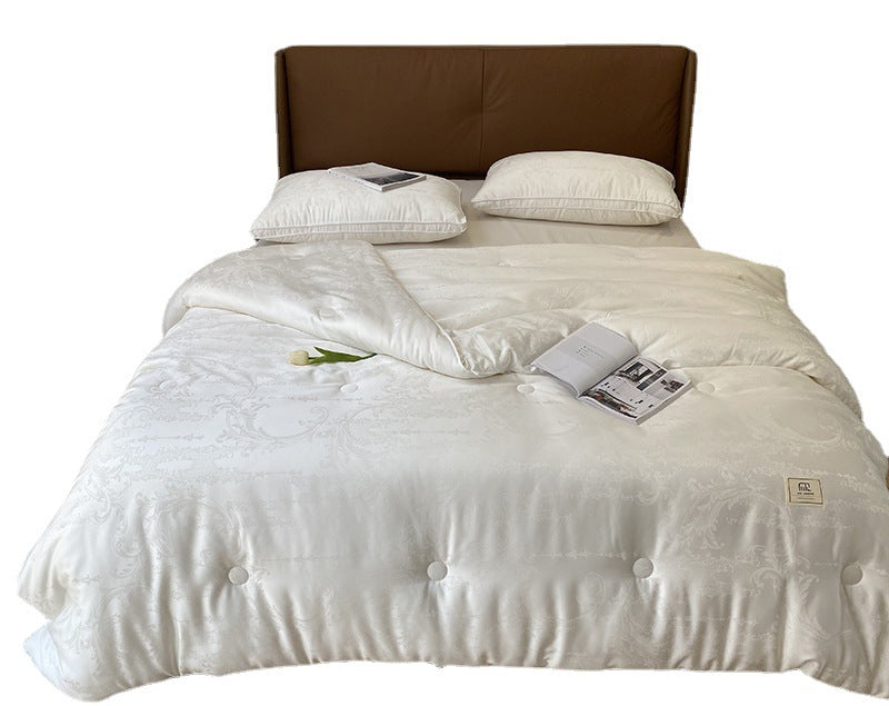 Extra light satin jacquard quilt with subtle button quilting