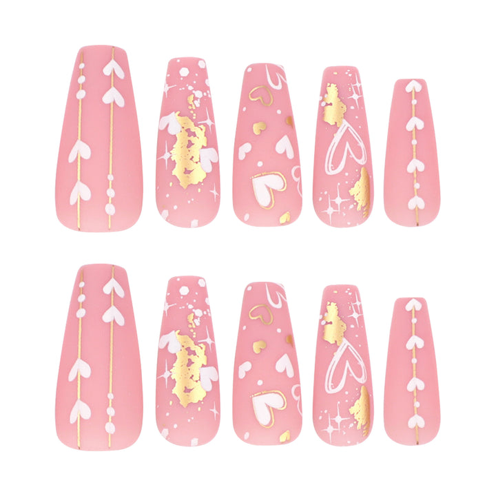 Artificial nail art with heart and glitter designs Kalsten