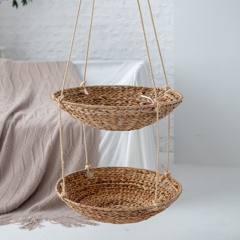 Hanging chair made of braided natural material with comfortable cushions Kalsten