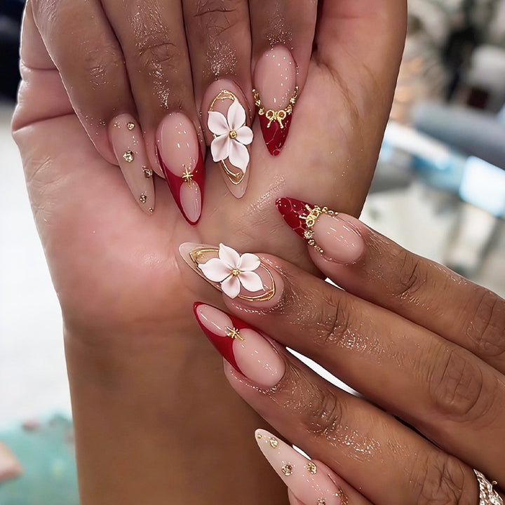 Acrylic nail set with floral accents and glamorous designs Kalsten