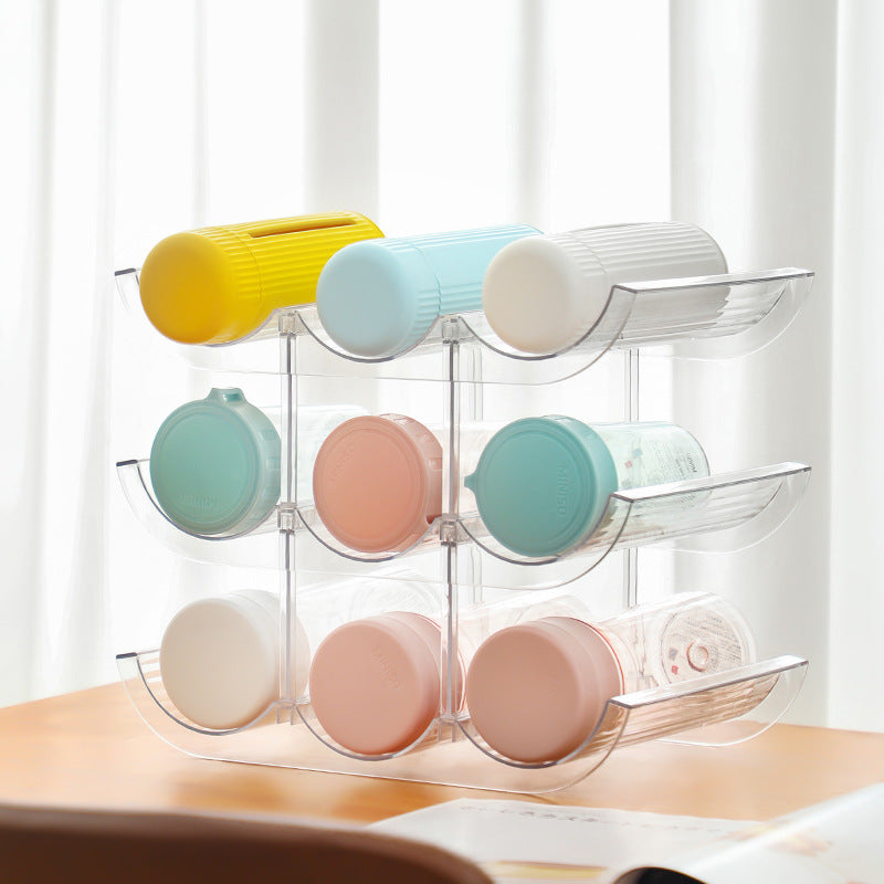 Stackable acrylic wine bottle holder with curved cavities for nine standard bottles