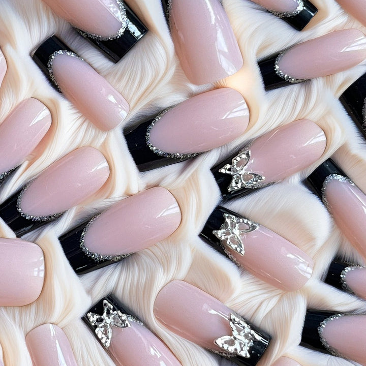 Glamorous Stiletto Nail Extensions with Butterfly Accents Kalsten