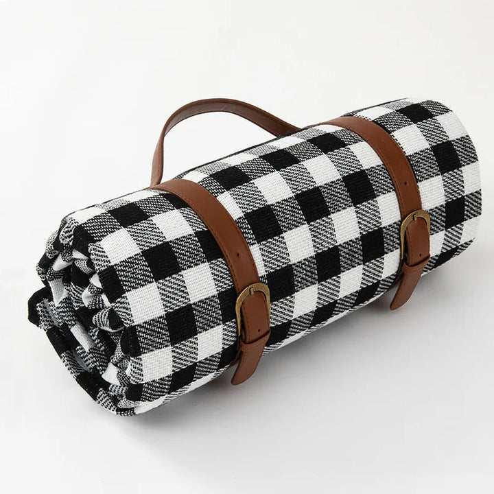 Waterproof picnic blanket with leather carrying strap | Kalsten