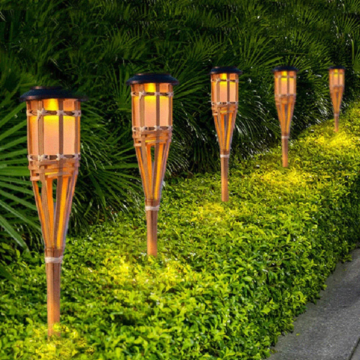 Solar-powered garden torches in bamboo design – Weatherproof LED decorative lighting for outdoors | Kalsten