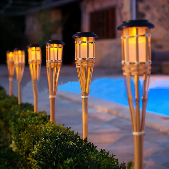 Solar-powered garden torches in bamboo design – Weatherproof LED decorative lighting for outdoors | Kalsten