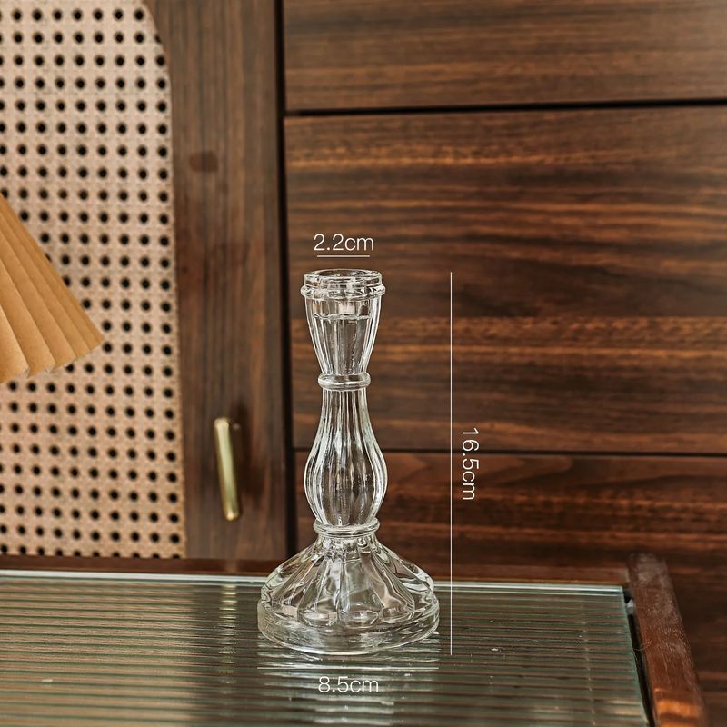 Glass candle holders in various shapes