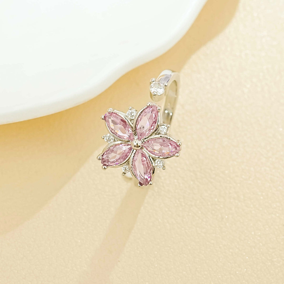 Copper ring with flower motif