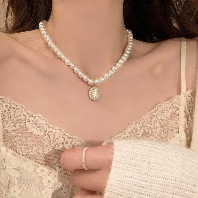 Pearl necklace with silver clasp, pearls 4–12 mm