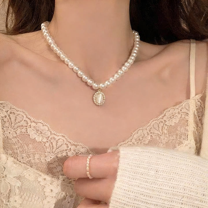 Pearl necklace with silver clasp, pearls 4–12 mm