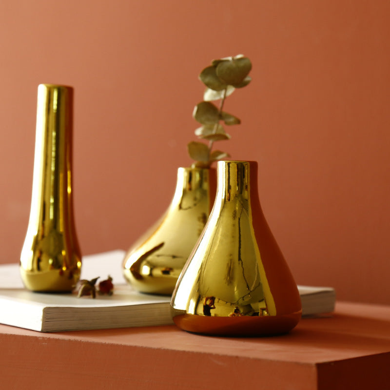 Ceramic flower vase with gold finish, geometric