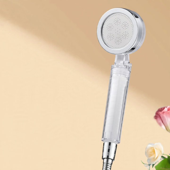 Hand shower with filter and pressure boost