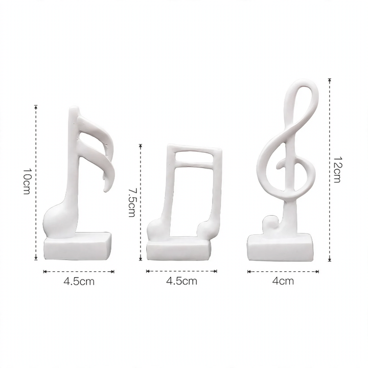 Three music note figures, resin, modern