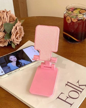 Rotating phone holder made of steel