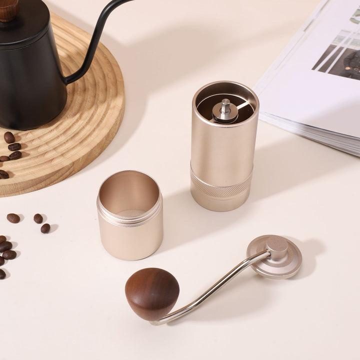 Hand coffee grinder with CNC grinding mechanism and brush