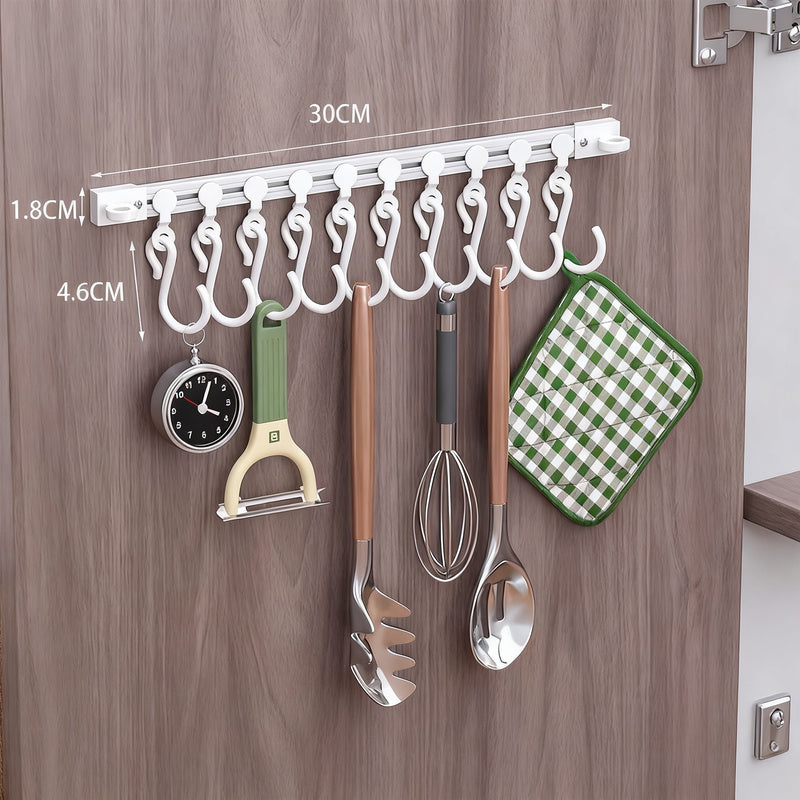 Track system with hooks for cabinet doors