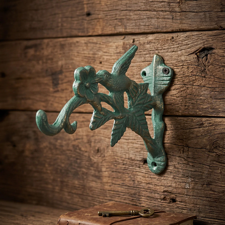 Cast iron wall hook with bird motif