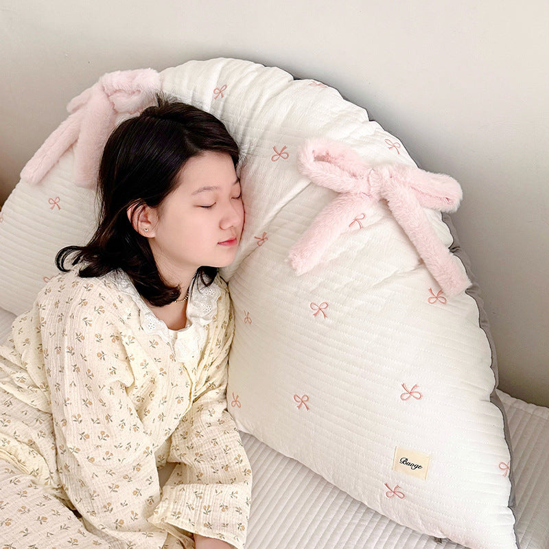 Cotton pillow with bow pattern