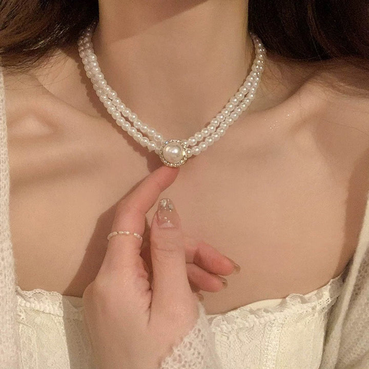 Pearl necklace with silver clasp, pearls 4–12 mm