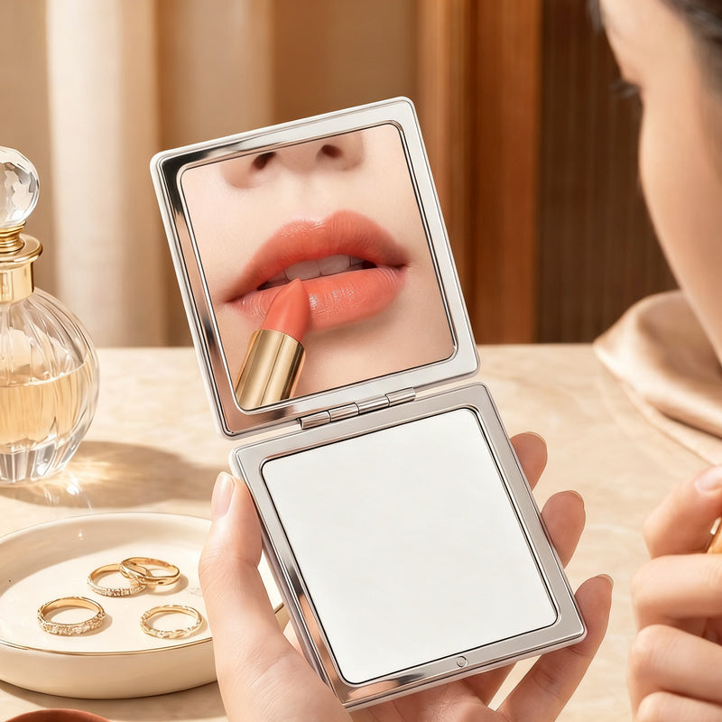 Folding cosmetic mirror, double-sided