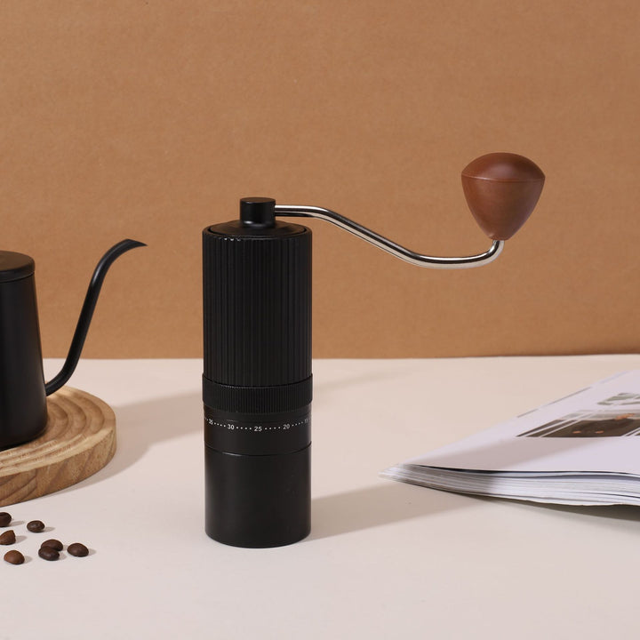 Hand coffee grinder with CNC grinding mechanism and brush