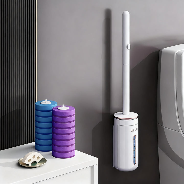 Toilet brush with interchangeable heads