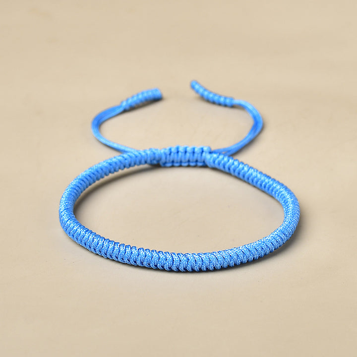 Hand-knotted rope bracelet in red