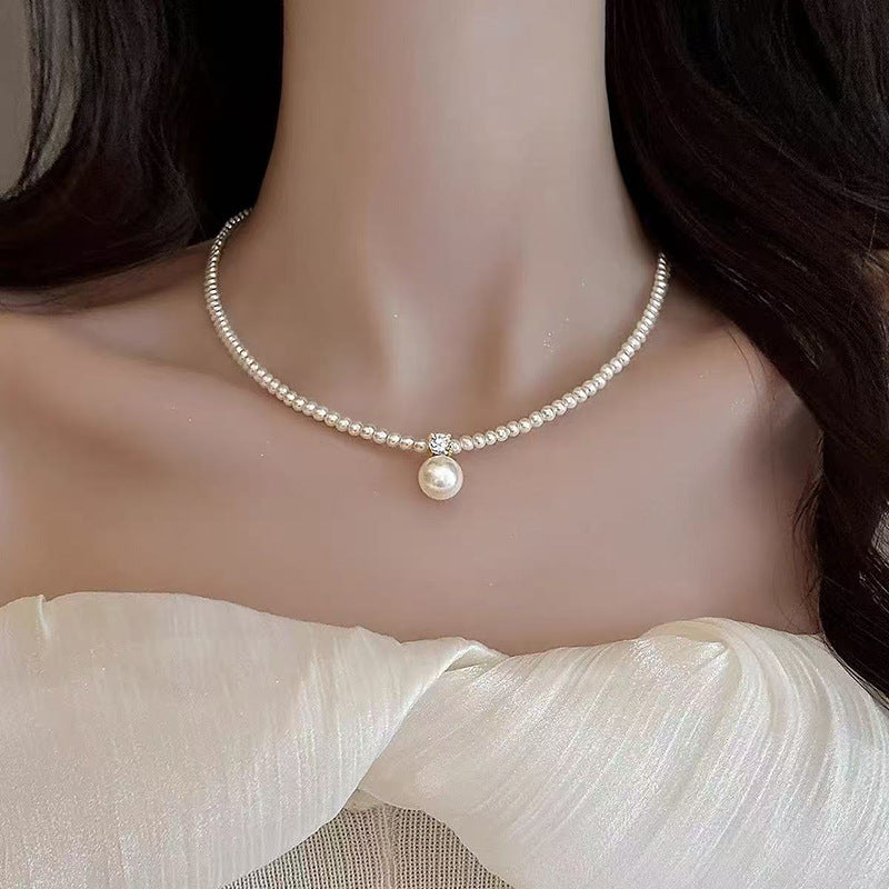 Pearl necklace with silver clasp, pearls 4–12 mm