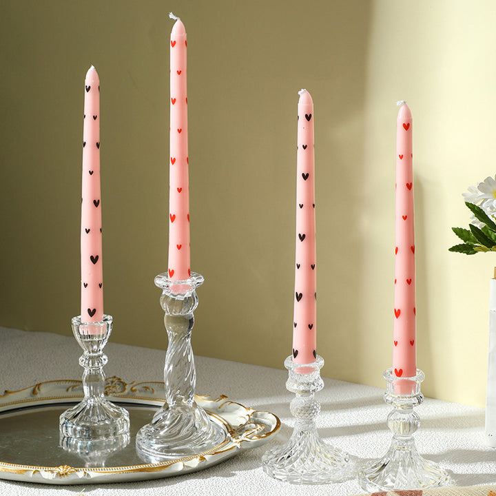 Transparent glass candle holder with structured pattern