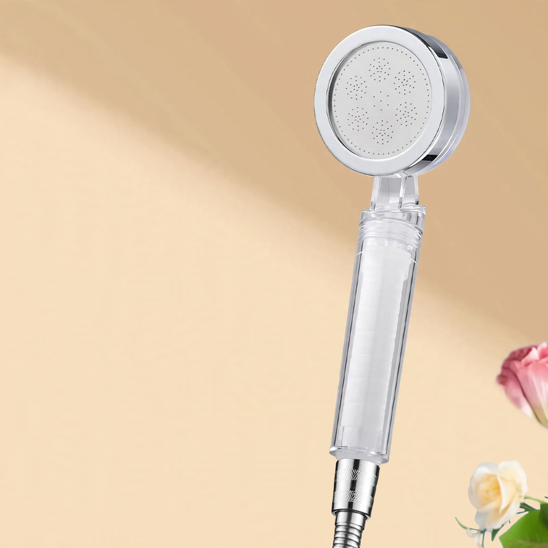 Hand shower with filter and pressure boost