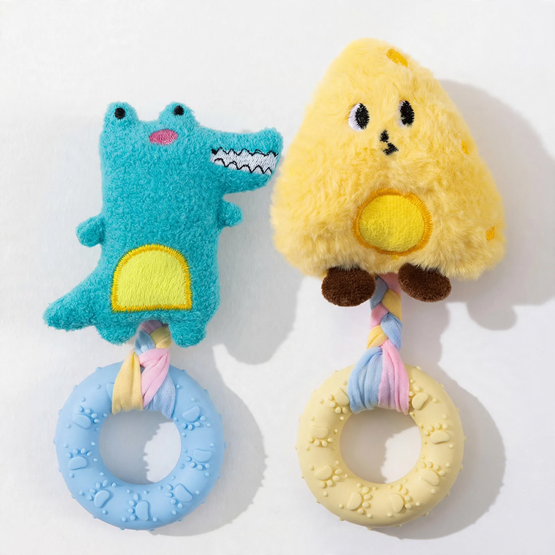 Dog toy with squeaker and dental care