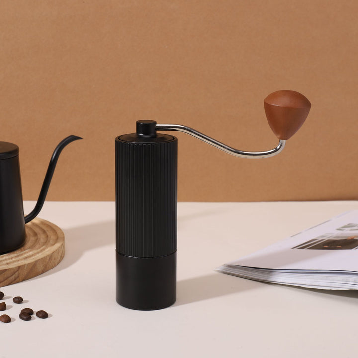Hand coffee grinder with CNC grinding mechanism and brush