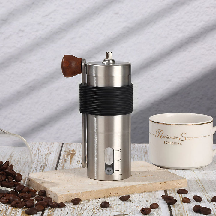 Hand coffee grinder with CNC grinding mechanism and brush