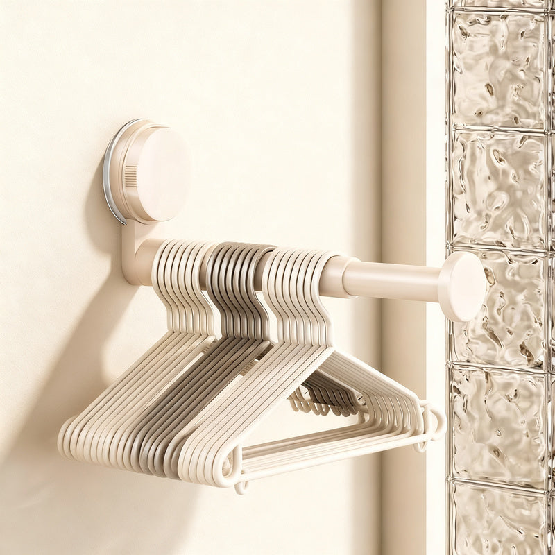 Telescopic clothes rail with suction cup